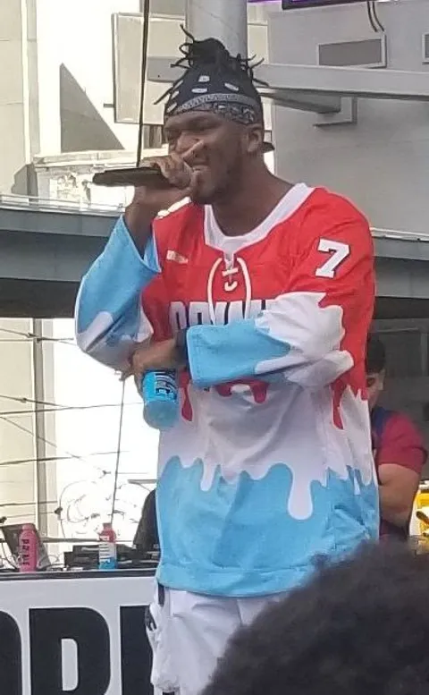 KSI on stage at Yonge-Dundas Square in Toronto in October 2023