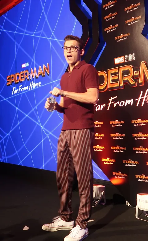 Tom Holland on stage at a Spider-Man: Far From Home fan event in May 2019